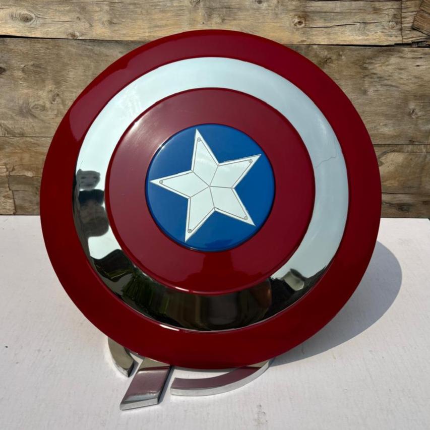 superhero shield
stainless steel shield
round cosplay shield
costume shield prop
superhero wall decor
comic con accessory
cosplay prop
handmade shield
collectible superhero item
steel cosplay gear
gift for superhero fan
fantasy battle shield
LARP shield