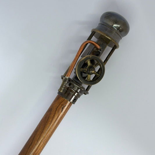 steampunk walking cane
gear handle walking stick
mechanical handle cane
steampunk cosplay accessory
collectible walking stick
vintage gadget cane
gentleman’s steampunk cane
industrial gear walking stick
handmade wooden cane
novelty steampunk gift
steampunk engineer prop
mechanical wheel cane
steampunk costume accessory